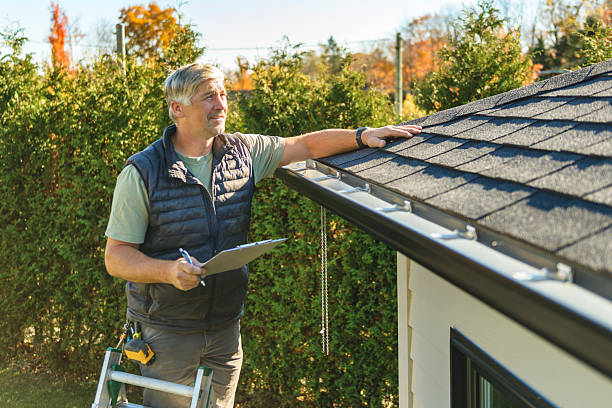 Professional Roof Replacement technician working in Grandin, ND